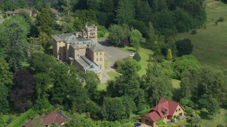 AX109_083E - 5.5K aerial stock footage of front of Manor Hall Center for Trauma hospital, Doune Scotland