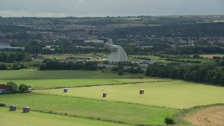 5.5K aerial stock footage approach The Kelpies sculptures, Falkirk, Scotland Aerial Stock Footage | AX109_120E