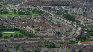 5.5K aerial stock footage flyby apartment buildings in Falkirk, Scotland Aerial Stock Footage | AX109_132E