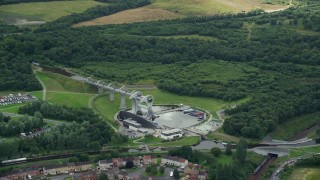 5.5K aerial stock footage flyby Falkirk Wheel by trees, Scotland Aerial Stock Footage | AX109_137