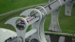 5.5K aerial stock footage flyby ferries on the Falkirk Wheel boat lift, Scotland Aerial Stock Footage | AX109_142E