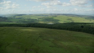 AX110_006E - 5.5K aerial stock footage approach Buckleburn Reservoir and farm fields, Denny, Scotland