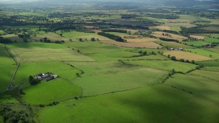 5.5K aerial stock footage fly over Scottish farms and fields near Kippen, Scotland Aerial Stock Footage | AX110_034E