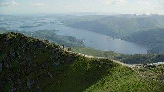 AX110_055E - 5.5K aerial stock footage of Loch Lomond seen from Ben Lomond, Scottish Highlands, Scotland