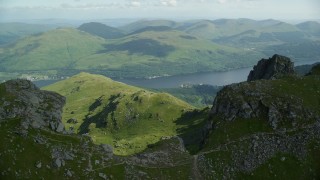 5.5K aerial stock footage of orbiting The Cobbler with views of Loch Long, Scottish Highlands, Scotland Aerial Stock Footage | AX110_078