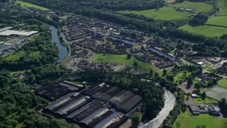 5.5K aerial stock footage of apartment buildings and warehouses, Alexandria, Scotland Aerial Stock Footage | AX110_135