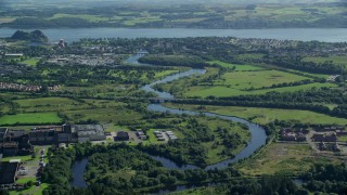 5.5K aerial stock footage approach River Leven and waterfront town, Dumbarton, Scotland Aerial Stock Footage | AX110_136E