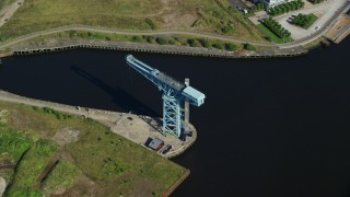 AX110_148 - 5.5K aerial stock footage approach Clydebank Titan Crane in Glasgow, Scotland