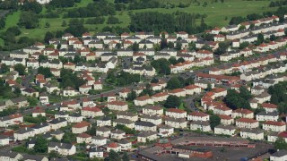 AX110_149 - 5.5K aerial stock footage of town houses in residential neighborhoods, Glasgow, Scotland