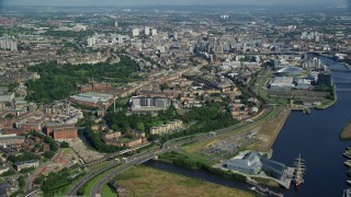 5.5K aerial stock footage of approaching city buildings in Glasgow, Scotland Aerial Stock Footage | AX110_154E