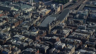 AX110_182 - 5.5K aerial stock footage of Glasgow Central train station, Scotland