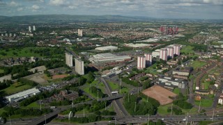 AX110_213E - 5.5K aerial stock footage of apartment buildings and warehouses, Glasgow, Scotland