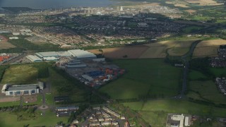 5.5K aerial stock footage of suburban houses and gas power plant, Falkirk, Scotland Aerial Stock Footage | AX111_008E