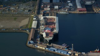 5.5K aerial stock footage aircraft carrier at Rosyth Dockyard on Firth of Forth, Scotland Aerial Stock Footage | AX111_059