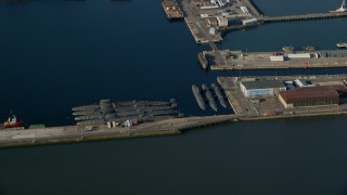 5.5K aerial stock footage of submarines at Rosyth Dockyard on Firth of Forth, Scotland Aerial Stock Footage | AX111_060