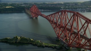 AX111_068 - 5.5K aerial stock footage of Forth Bridge on Firth of Forth, Scotland