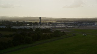 5.5K aerial stock footage of Edinburgh Airport and control tower, Scotland Aerial Stock Footage | AX111_169