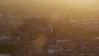 5.5K aerial stock footage of Edinburgh Castle and The Hub at sunset, Scotland Aerial Stock Footage | AX112_046