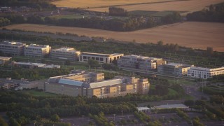 5.5K aerial stock footage flyby an office building at sunset in Edinburgh, Scotland Aerial Stock Footage | AX112_114E