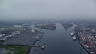 AX113_077E - 5.5K aerial stock footage of flying over docks at the Port of Belfast, Northern Ireland