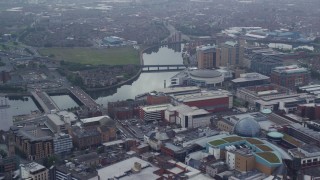 5.5K aerial stock footage of shopping center and bridges over River Lagan, Belfast, Northern Ireland Aerial Stock Footage | AX113_117