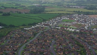 5.5K aerial stock footage of neighborhoods on the outskirts of Belfast, Northern Ireland Aerial Stock Footage | AX113_130