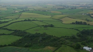 5.5K aerial stock footage of green fields and farms, Newtownards, Northern Ireland Aerial Stock Footage | AX113_133E