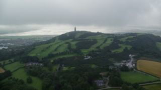 5.5K aerial stock footage approach Scrabo Tower atop a hill, Newtownards, Northern Ireland Aerial Stock Footage | AX113_135E