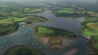 5.5K aerial stock footage of Quoile Yacht Club in Strangford Lough, Downpatrick, Northern Ireland Aerial Stock Footage | AX113_157E