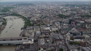 5.5K aerial stock footage of office buildings near River Thames, Central London, England Aerial Stock Footage | AX114_040