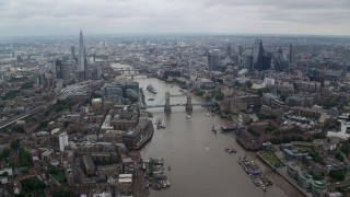 5.5K aerial stock footage of the Shard and Tower Bridge over River Thames, Central London England Aerial Stock Footage | AX114_053E