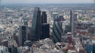 5.5K aerial stock footage of orbiting The Gherkin and Heron Tower skyscrapers, Central London, England Aerial Stock Footage | AX114_104E