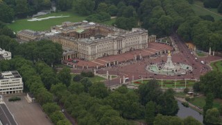 5.5K aerial stock footage of flying by Buckingham Palace and Victoria Memorial, London, England Aerial Stock Footage | AX114_190E