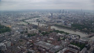 5.5K aerial stock footage fly over Big Ben and Westminster Bridge toward London Eye, England Aerial Stock Footage | AX114_194E