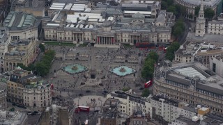 5.5K aerial stock footage of orbiting Trafalgar Square, London, England Aerial Stock Footage | AX114_199E