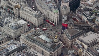 5.5K aerial stock footage of Piccadilly Circus with tourists and buses, London, England Aerial Stock Footage | AX114_242E