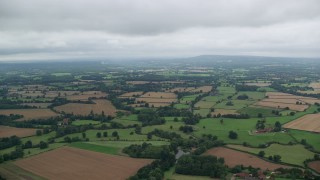 5.5K aerial stock footage of flying by farmland, Redhill, England Aerial Stock Footage | AX114_382