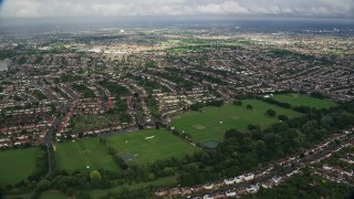 5.5K aerial stock footage fly over homes in residential neighborhoods, Surbiton, England Aerial Stock Footage | AX115_034E