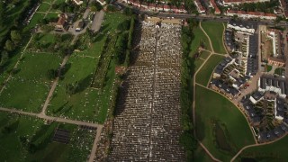 5.5K aerial stock footage tilt to bird's eye view of a cemetery in London, England Aerial Stock Footage | AX115_048