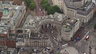 5.5K aerial stock footage of approaching The Admiralty Arch at Trafalgar Square, London England Aerial Stock Footage | AX115_098E