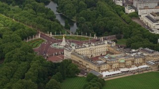 5.5K aerial stock footage orbiting Buckingham Palace and Victoria Memorial, London, England Aerial Stock Footage | AX115_130E