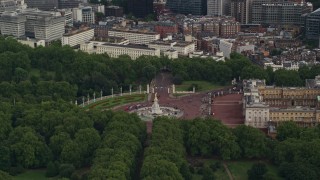 5.5K aerial stock footage of circling the Victoria Memorial at Buckingham Palace, London, England Aerial Stock Footage | AX115_133