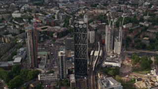 5.5K aerial stock footage of an approach to the Strata skyscraper, London, England Aerial Stock Footage | AX115_149E