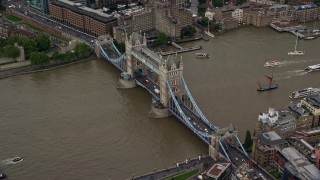 5.5K aerial stock footage of River Thames and the Tower Bridge, London, England Aerial Stock Footage | AX115_171E