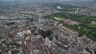 AX115_216E - 5.5K aerial stock footage pan across office buildings near Buckingham Palace, London, England