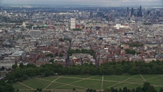 5.5K aerial stock footage of a view of the London cityscape from Hyde Park, England Aerial Stock Footage | AX115_227