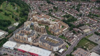 AX115_291E - 5.5K aerial stock footage of orbiting a condominium complex, Croydon, England