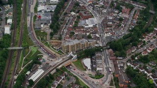 5.5K aerial stock footage tilt to bird's eye view of an office building, Purley, England Aerial Stock Footage | AX115_300