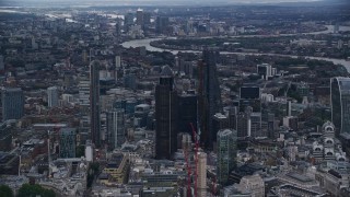 5.5K aerial stock footage of Heron Tower, Tower 42, The Gherkin, Leadenhall skyscrapers, London, England, twilight Aerial Stock Footage | AX116_011E