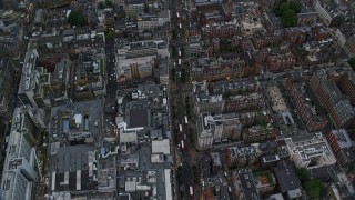 5.5K aerial stock footage of flying over Oxford Street with double decker buses, London, England, twilight Aerial Stock Footage | AX116_050E